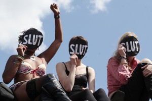 SlutWalk participants cheer a speaker, after walking from Hyde Park Corner, in Trafalgar Square, central London